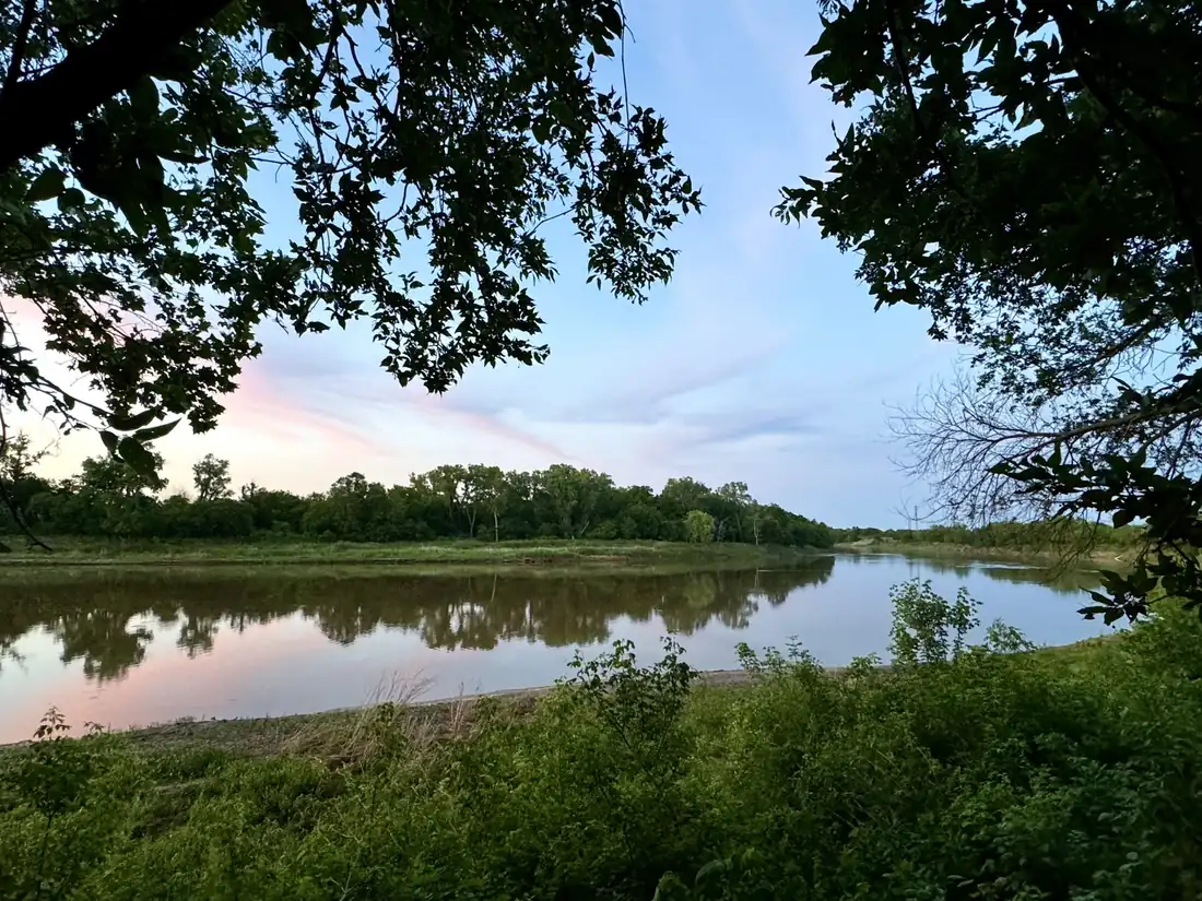 Calm Salt Fork River reflecting the evening sky